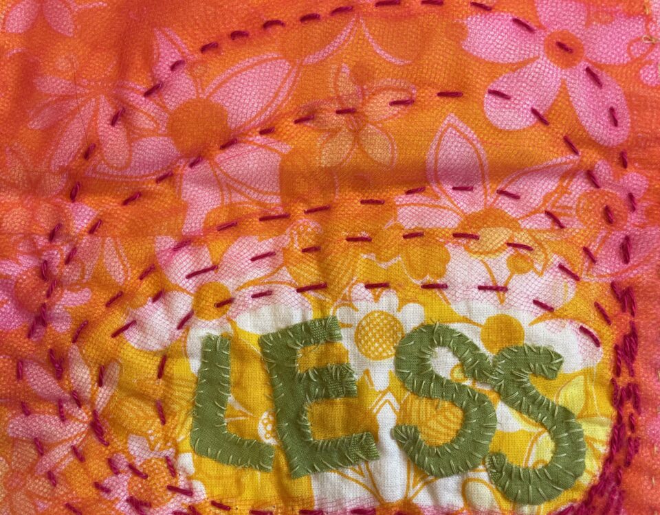 pic of embroidered word LESS