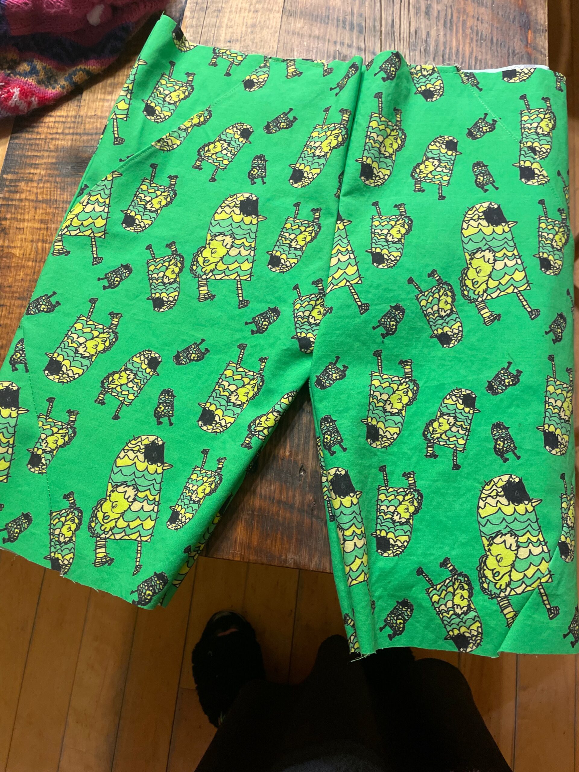 green shorts with chicken character